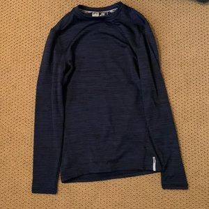 Dark blue RBX long-sleeve shirt for skiing.